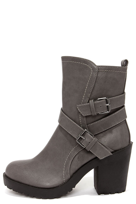 gray boots with buckles