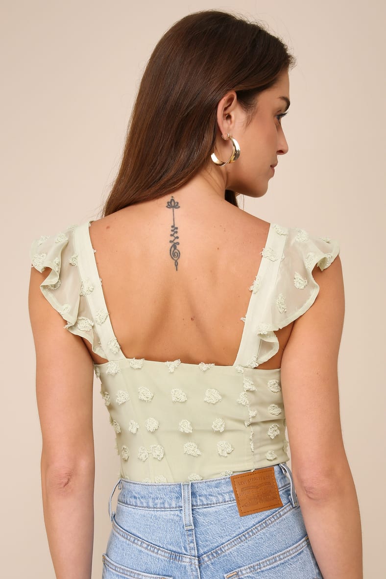 Iconic Cutie Light Green Swiss Dot Ruffled Sleeveless Bodysuit