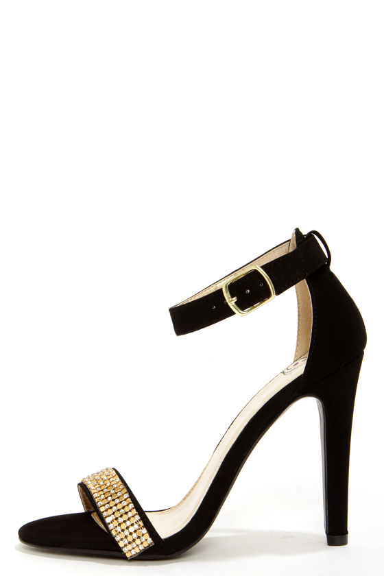 black heels with gold detail