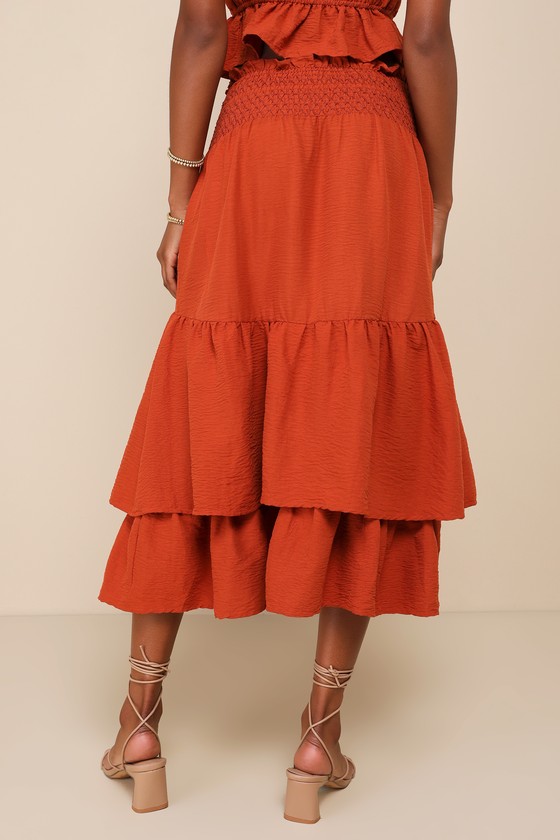 Jacquie The Label Exceedingly Effortless Rust Orange Smocked Tiered Midi Skirt In Rust Orange