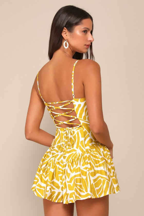 LULUS SUNNY DAY DESIGN IVORY AND YELLOW GEO PRINT LACE-UP ROMPER