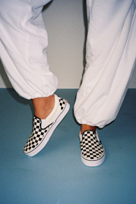 Classic Black & White Checkerboard Slip-On Sneakers 1