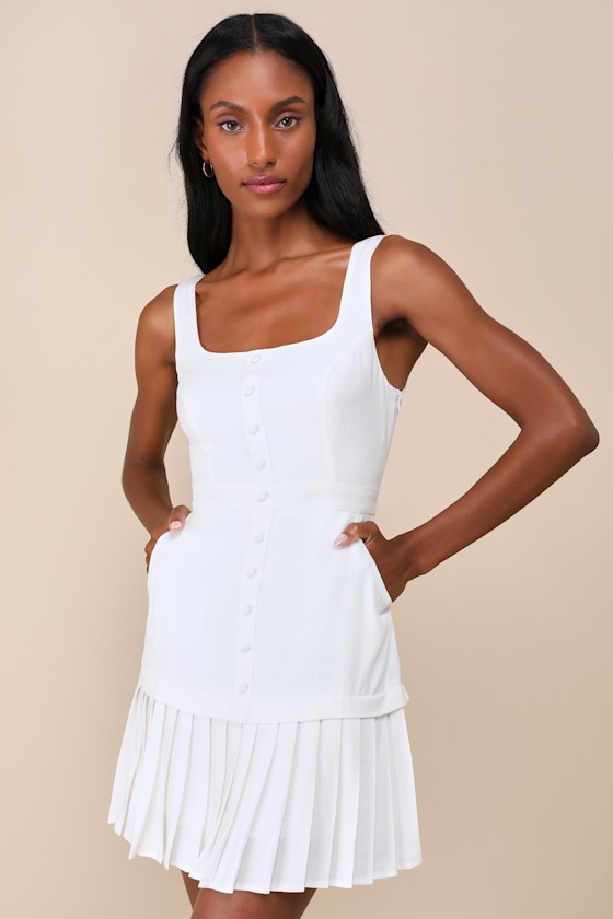 Poised and Chic White Linen Pleated Mini Dress with Pockets 1