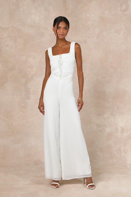 Lulus Majorly Iconic White Swiss Dot Ruffled Lace-up Jumpsuit In White