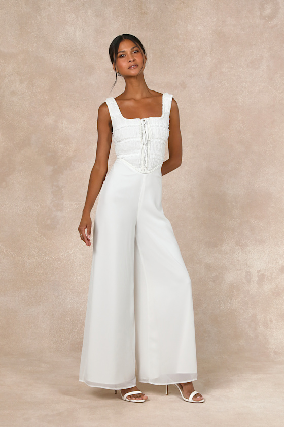 Lulus Majorly Iconic White Swiss Dot Ruffled Lace-up Jumpsuit In White