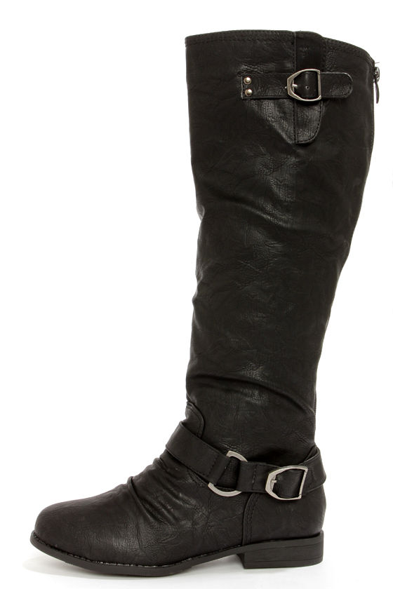 distressed black riding boots