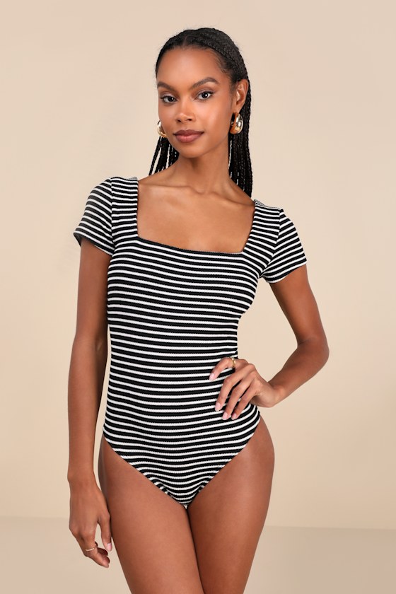 Lulus Casual Adventures Black Striped Ribbed Short Sleeve Bodysuit In Black