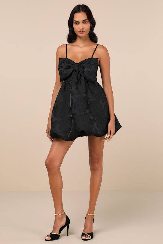 Lulus Coquettish Charm Black Bubble Hem Bow Mini Dress With Pockets In Black