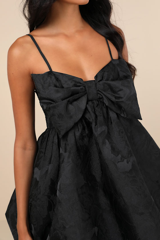 Lulus Coquettish Charm Black Bubble Hem Bow Mini Dress With Pockets In Black