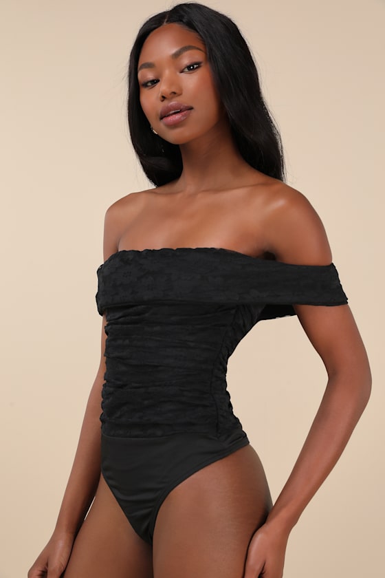 Lulus Sultry Whimsy Black Lace Off-the-shoulder Bodysuit In Black