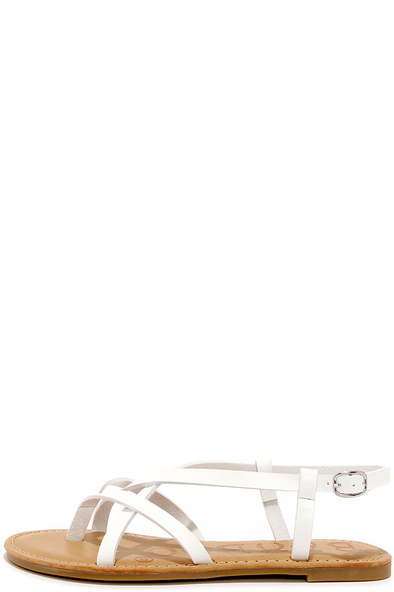 white strappy flat sandals