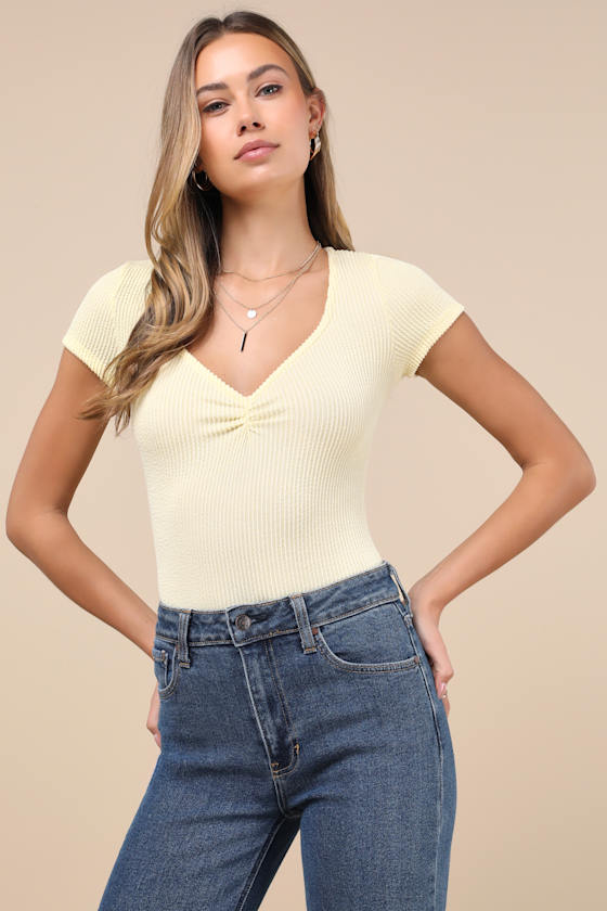 LULUS REQUIRED STYLE PALE YELLOW TEXTURED RIBBED RUCHED BODYSUIT
