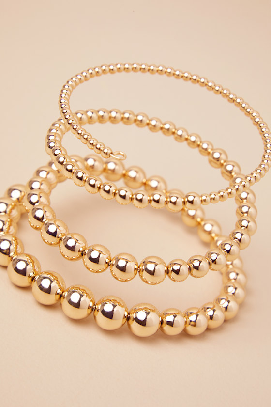 LULUS NYOKA GOLD BEADED COIL CUFF BRACELET