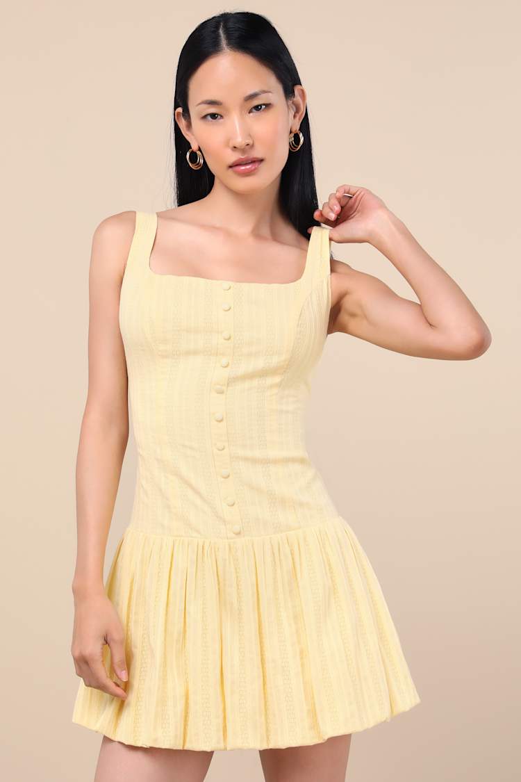 Khamari Yellow Textured Drop Waist Bubble-Hem Mini Dress
