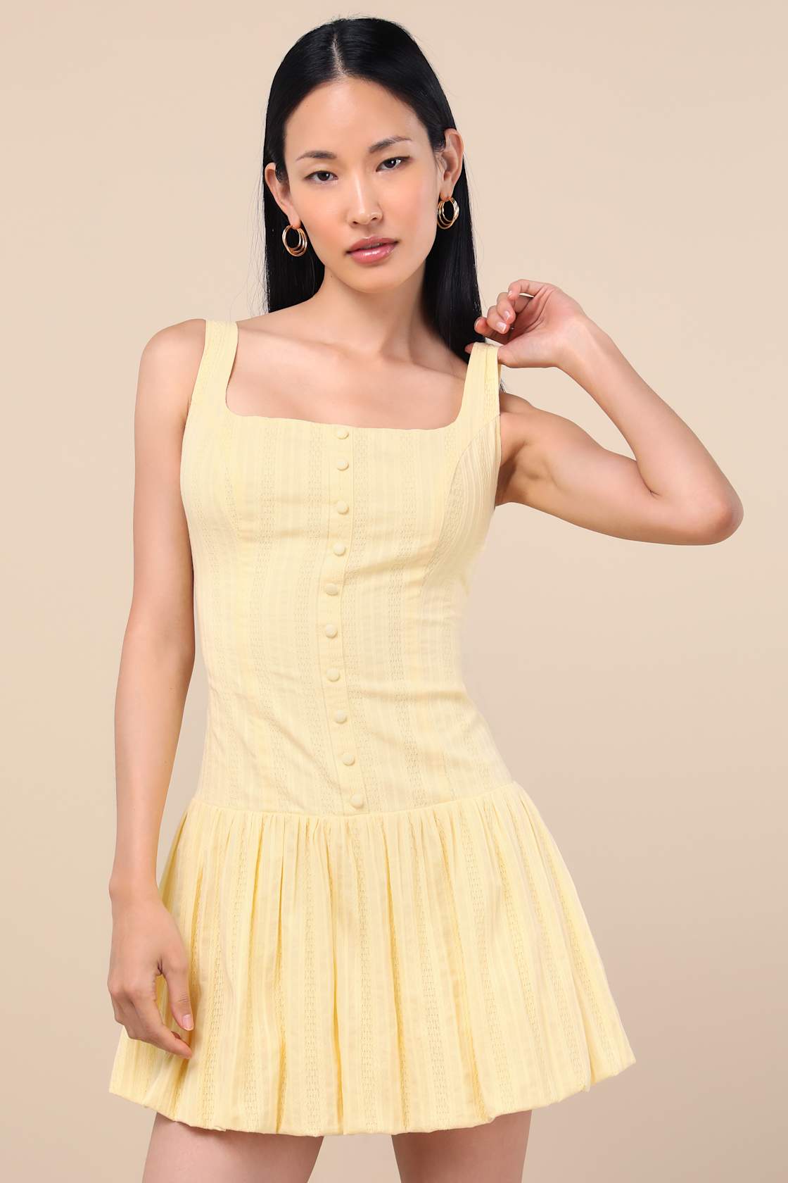 Khamari Yellow Textured Drop Waist Bubble-Hem Mini Dress