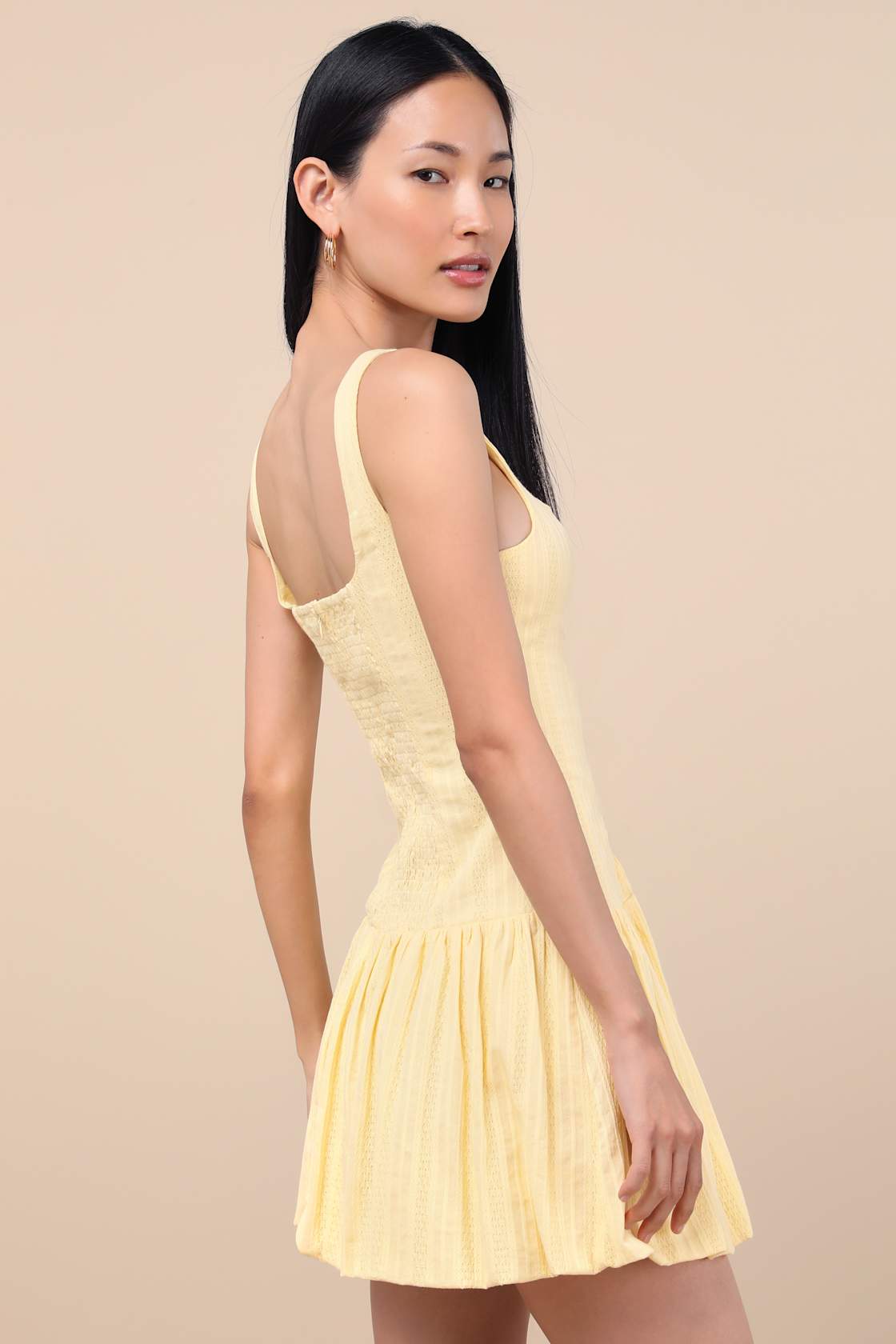 Khamari Yellow Textured Drop Waist Bubble-Hem Mini Dress