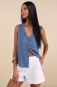 Marieke Ivory Pleated High-Rise Shorts 1