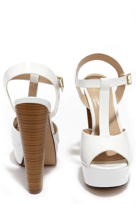 white strappy platform heels