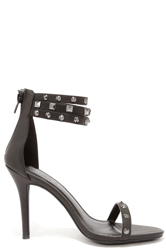 black heels with straps up the leg