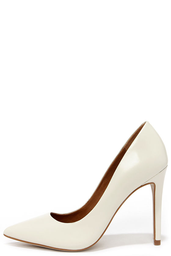 pointed white pumps
