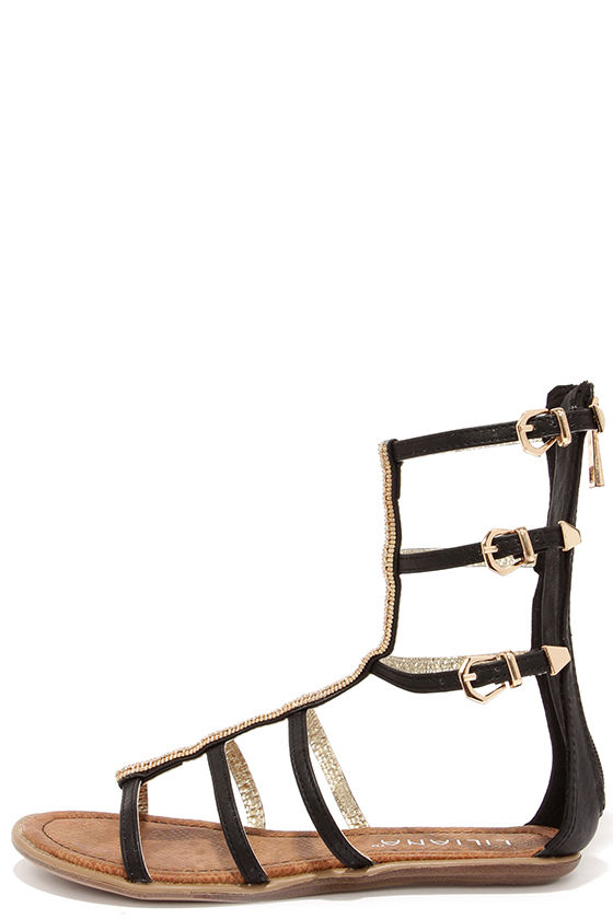 black and gold gladiator heels