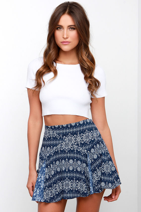 black top with navy blue skirt