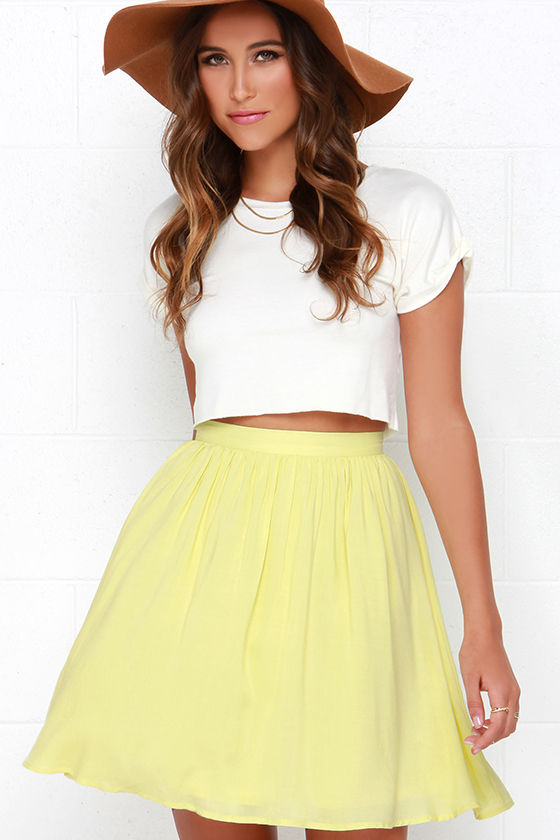 white top yellow skirt