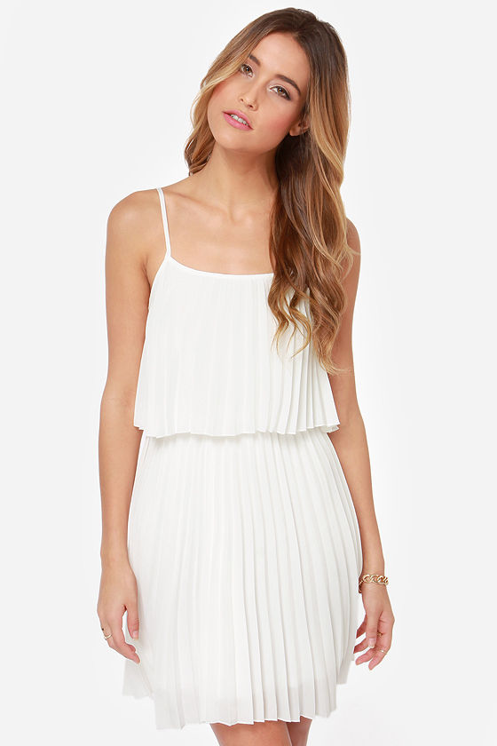 white dress with pleated skirt