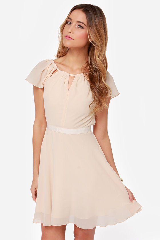 peach dress with white shoes