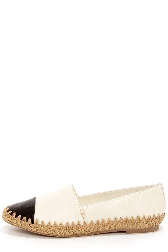 beige flats with black tips