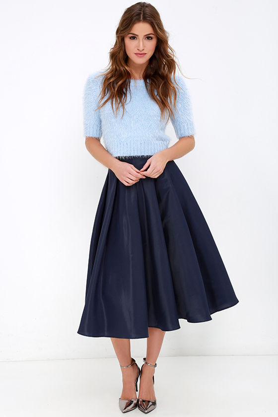 black top with navy blue skirt
