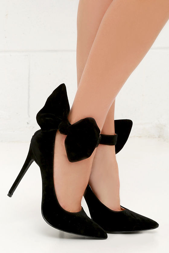 black heels with bow on back