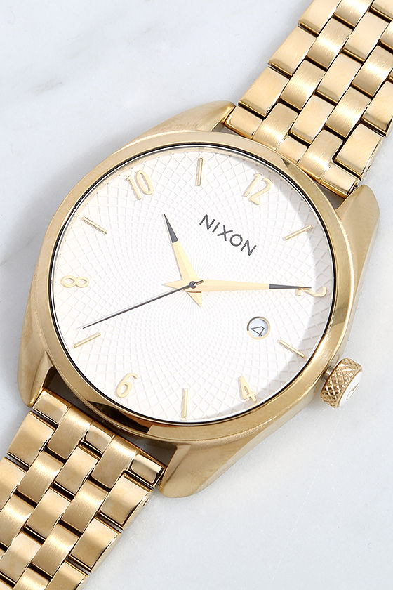 Nixon on sale bullet gold