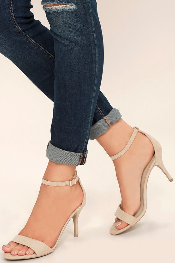 beige heels with black toe