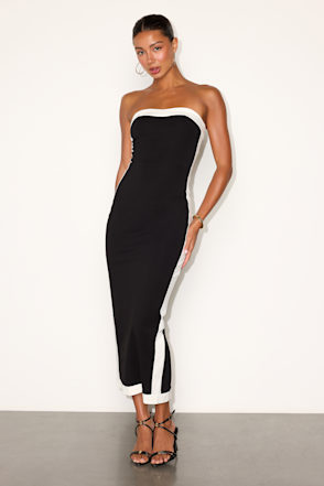 strapless black and white dress Dolly & Crystal Bow Detailed Mini Bandage Lightweight material Slight stretch material Unlined Satin Strapless Midi length Dropped open back White frill detail along top Invisible zip along the side Bias cut Perfect for parties Mill Women's dress with a