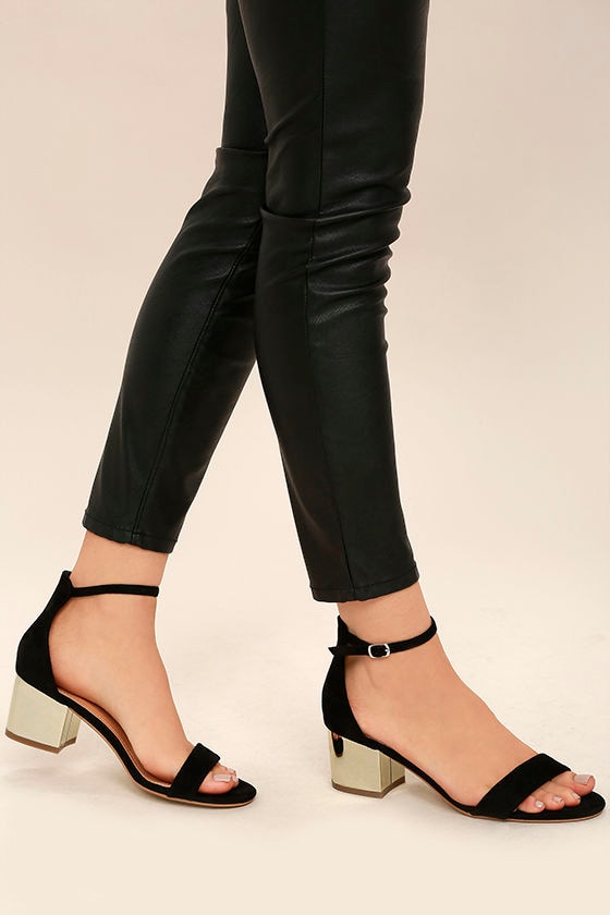 black and gold tie up heels