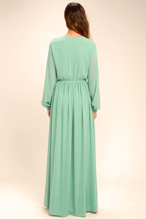 sage green gown with sleeves