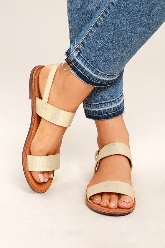 gold flat sandals with ankle strap