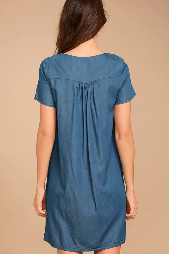 Chambray blue shift dress with jamdani detailing.