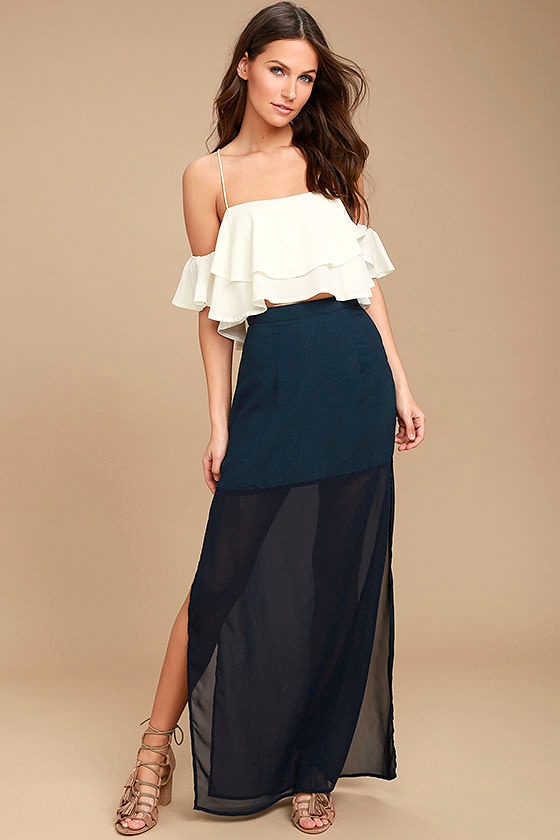 black top with navy blue skirt