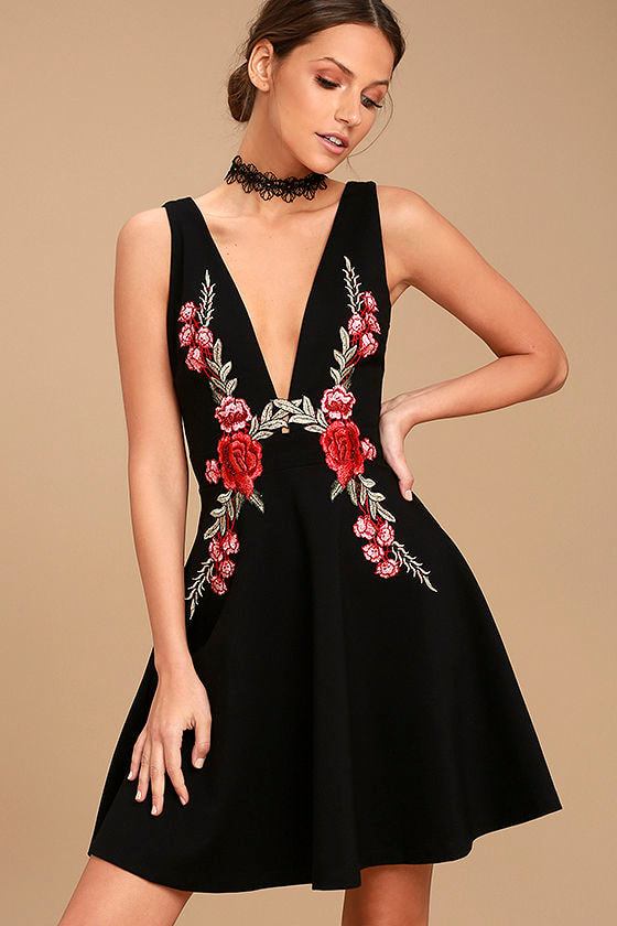 black dress with embroidered roses