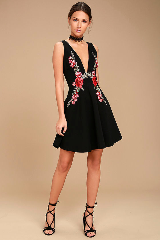 black dress with embroidered roses