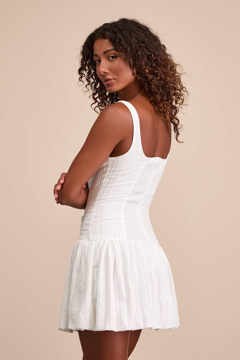 Khamari White Textured Drop Waist Bubble-Hem Mini Dress
