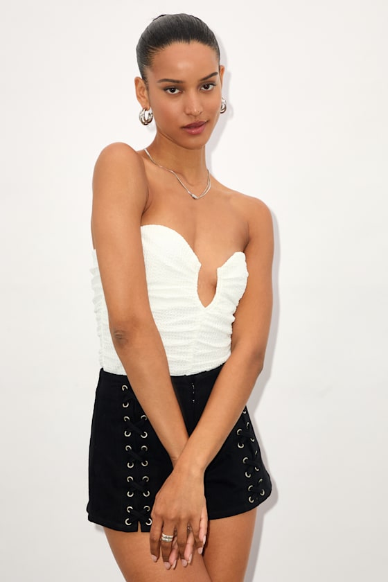Image of Muna White Textured Strapless Cutout U-Bar Bodysuit