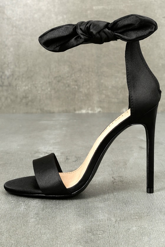 black heels with bow strap