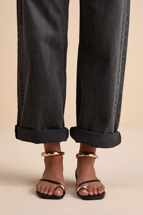 Odyssey Black and Gold Leather Ankle Strap Sandals