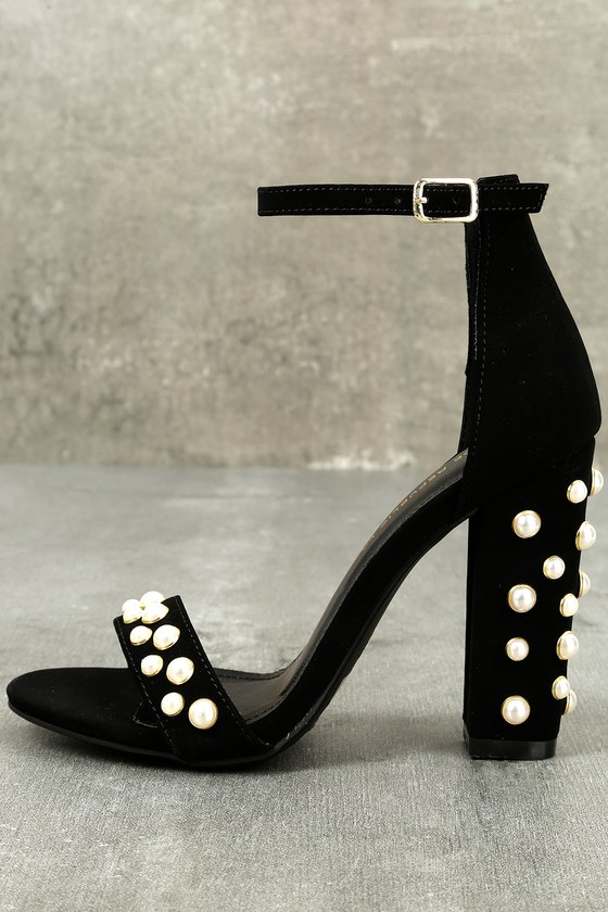 high heels with pearls on them