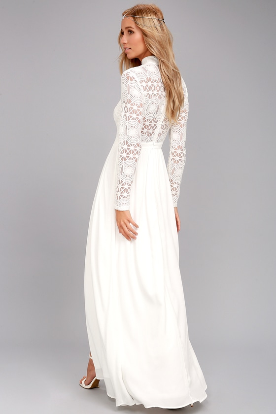 white floor length dress with sleeves