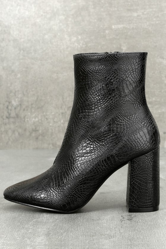 black snake print heeled boots