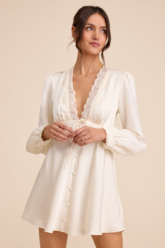 white long sleeve babydoll dress Super Oversized BK NK Shirt Mini Fluttery ruffles and romantic lace trim boost the charm of this lightweight minidress framed by gently puffed bishop sleeves and a flounced hem. Sunshine Pact Babydoll Dress In